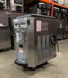 Right side angle photo of a taylor 430 with Taylor ice cream machines behind